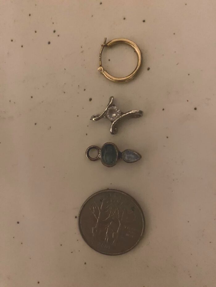 Small jewelry pieces and a coin found in hidden places in people’s homes, showing unexpected things discovered in walls.
