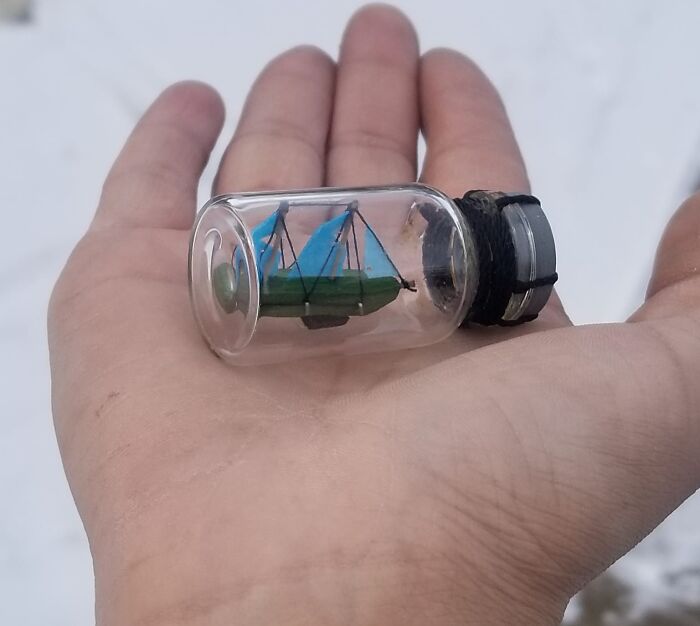 Tiny ship model inside a glass bottle found in walls and other hidden places in people's homes.
