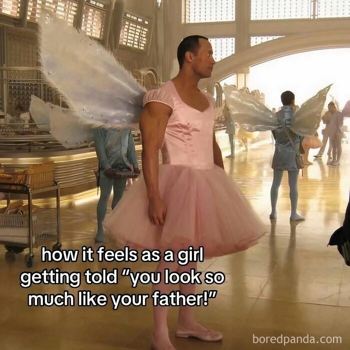 A muscular man in a pink tutu feeling awkward, illustrating relatable memes about navigating the world as a woman today.