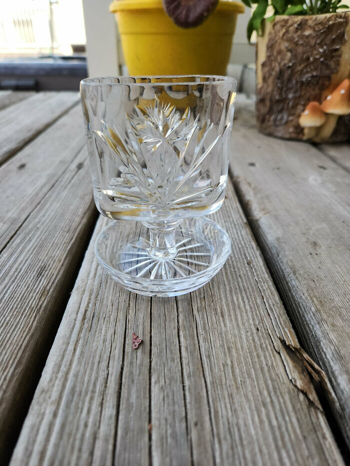 Cut glass decorative object with intricate patterns, featured in a collection of mystery objects recognized by an online group.