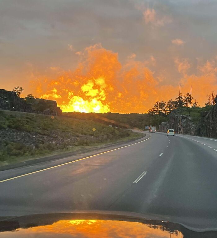 Sunset reflection on a winding highway creates an interesting illusion, one of the things that required a double take to realize.