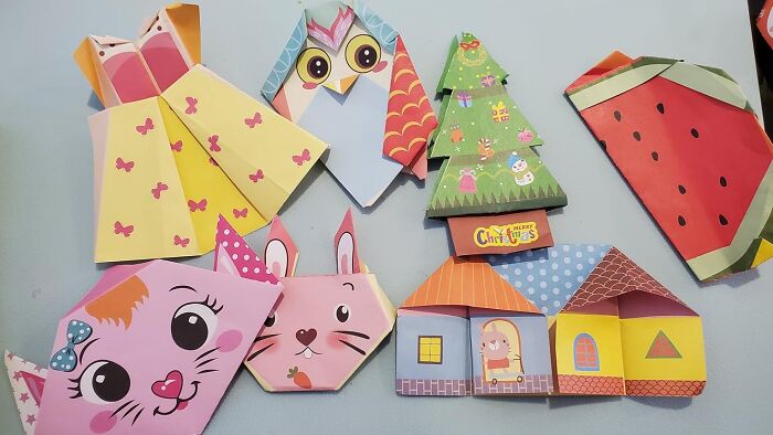 Colorful paper origami crafts including animals, trees, and houses showcasing creative arty finds for your inspiration.