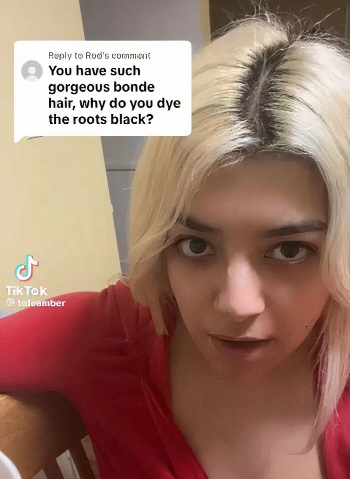 Young woman with blonde hair responding to a comment, showcasing a reality check on misogynists in a TikTok video.