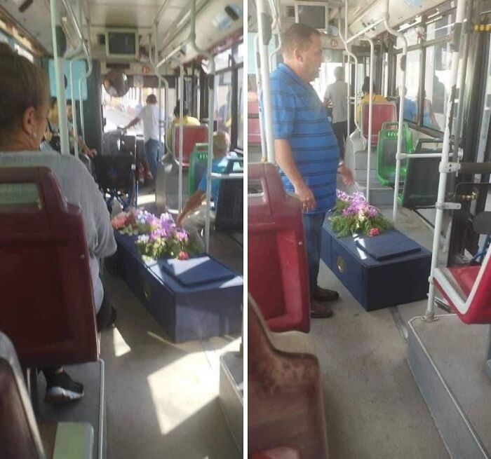 Man standing next to a coffin with flowers inside a crowded public transport bus, highlighting infuriating passengers.