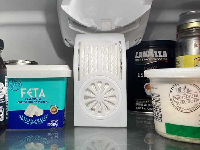 Air freshener in a pantry surrounded by chemical-free food products promoting clean living simplicity.