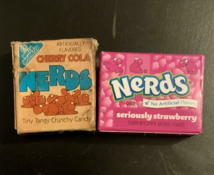 Comparison pics of vintage and modern Nerds candy boxes showing variety in packaging and flavors over time.
