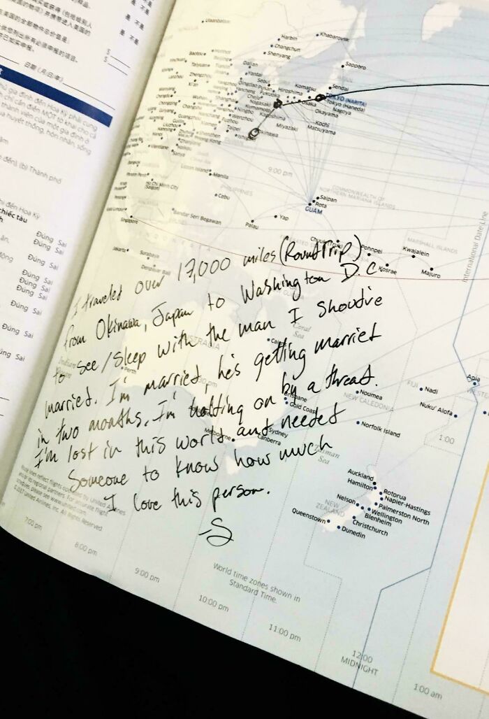 Handwritten note on a world map page detailing a 17,000-mile round trip, a personal story, and emotional memento.