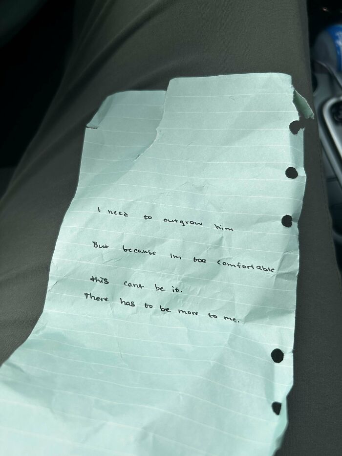 Torn handwritten note on lined paper with a personal message, one of the historical mementos people randomly found.