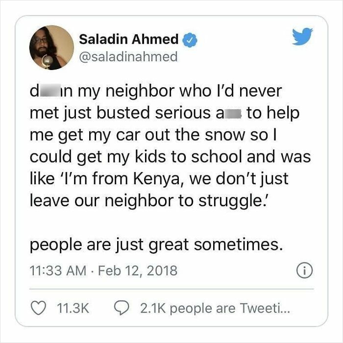 Tweet showing a neighbor helping get a car out of the snow, highlighting wholesome and feel-good community moments.
