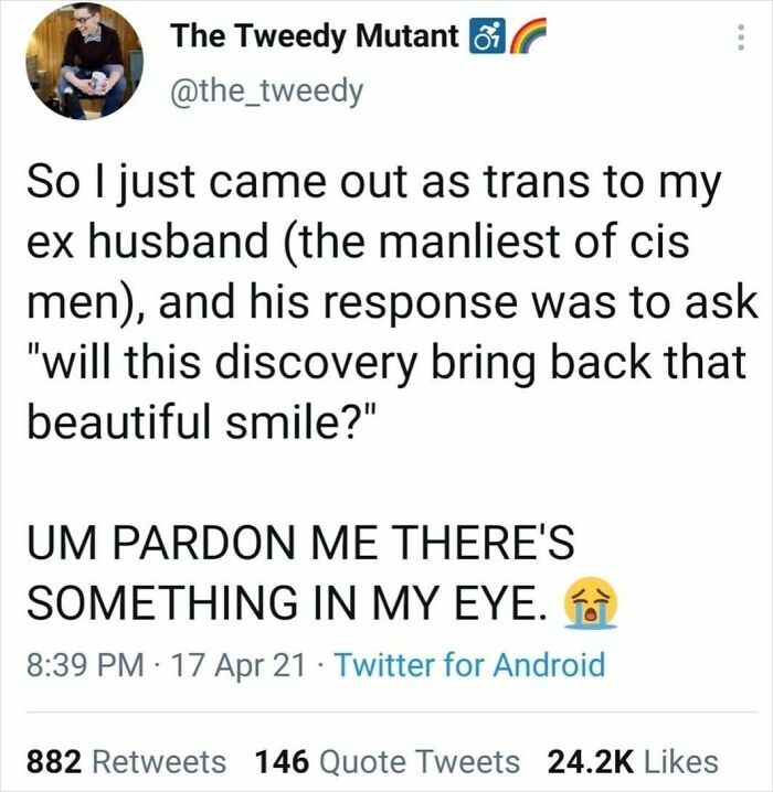 Tweet about coming out as trans and receiving a supportive response, reflecting wholesome feel-good moments restoring faith in humanity.