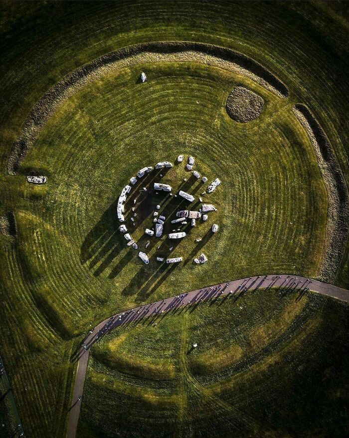 Aerial view of a famous landmark showing stone formations and circular patterns from unexpected angles.