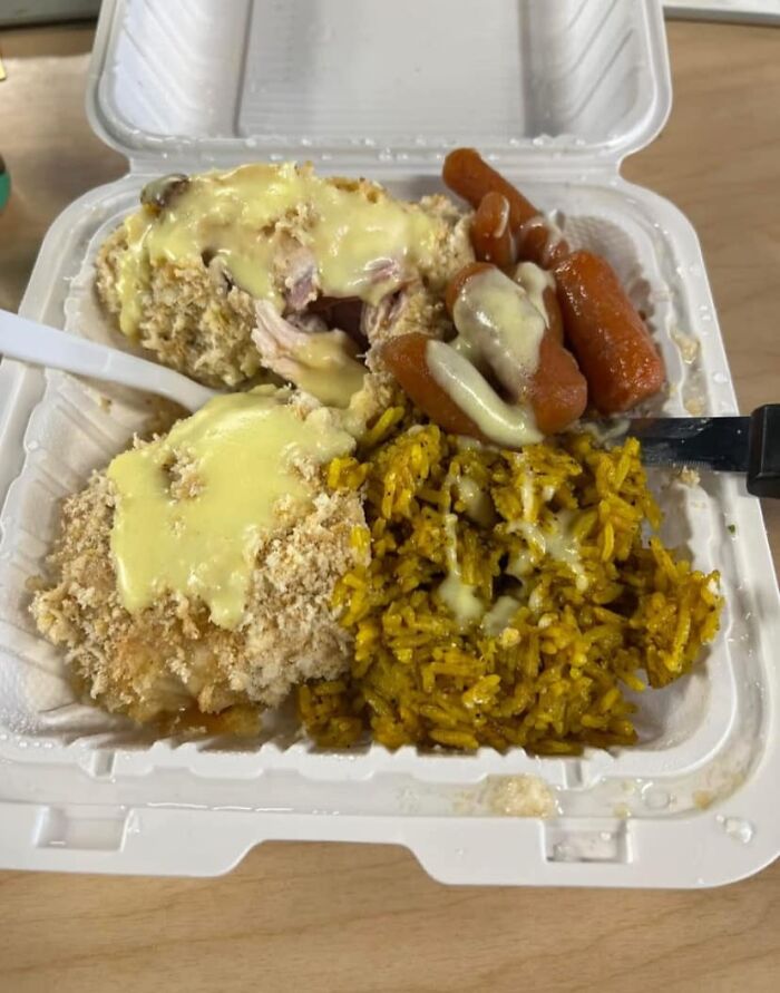 Takeout tray with breaded chicken, yellow rice, carrots, and a questionable creamy sauce in gross foods that lose appetite list.