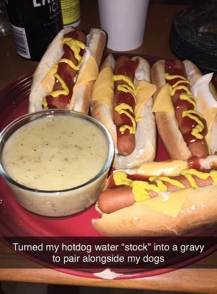 Plate of hotdogs with mustard and cheese slices served with a bowl of unusual hotdog water gravy gross food pairing.