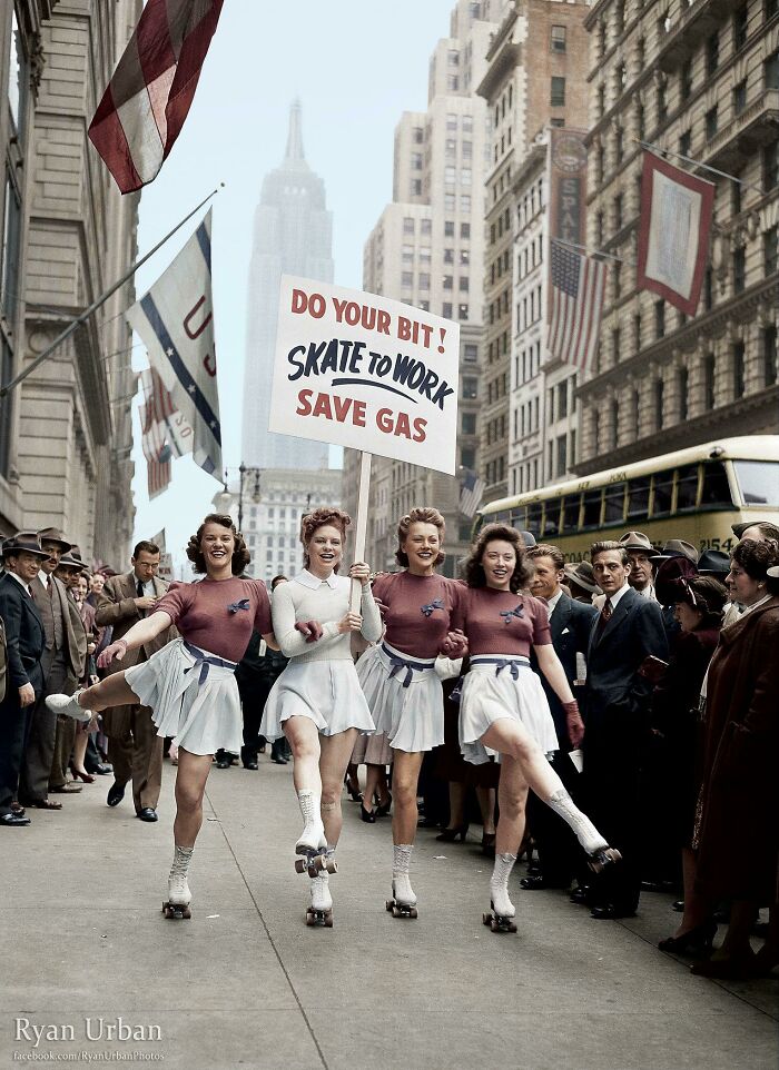 Four women roller skating on a city street holding a sign to save gas in interesting colorized history pics.