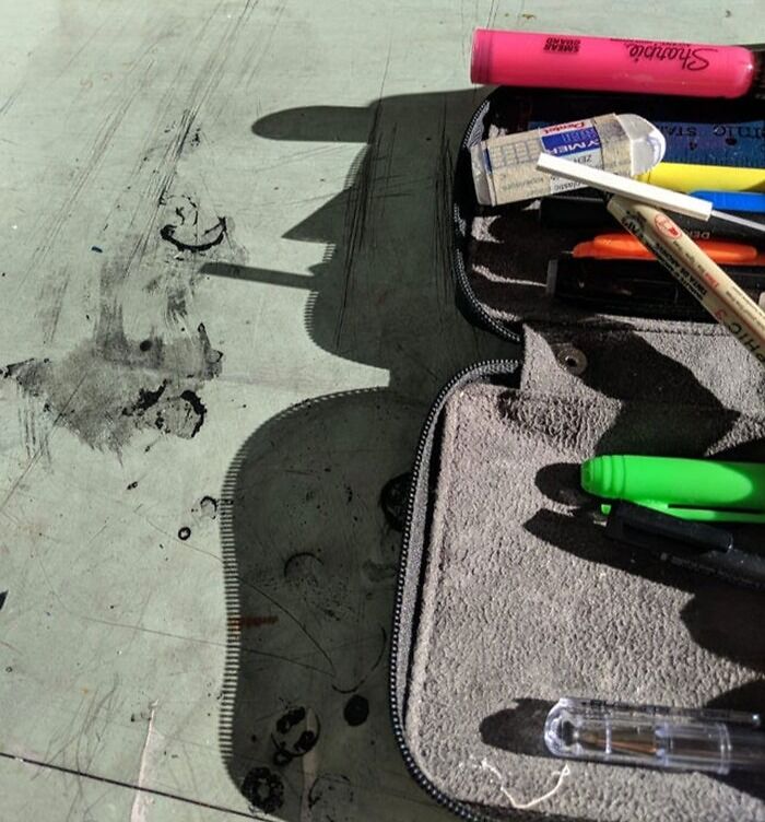 Shadow cast by a pencil case and stationery creating a cool, interesting, or bizarre shadow that made people look twice.