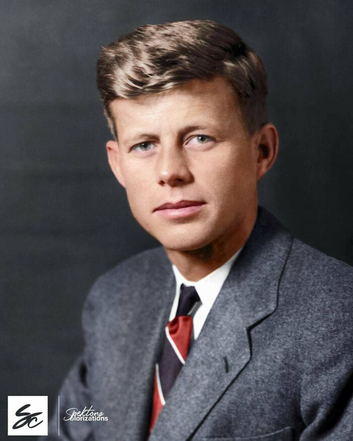 Colorized historic portrait of a man in a suit and tie, showcasing interesting colorized history pics with clear facial features.