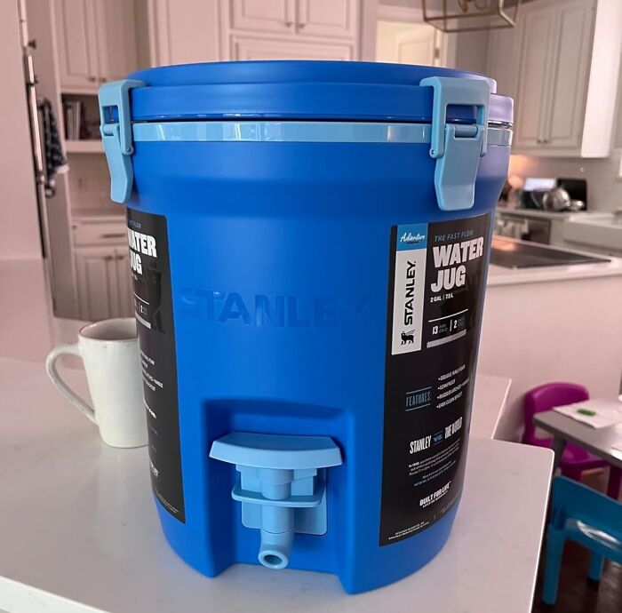 Blue Stanley water jug on kitchen counter, highlighting one of Amazon's most wished for and bestselling items.