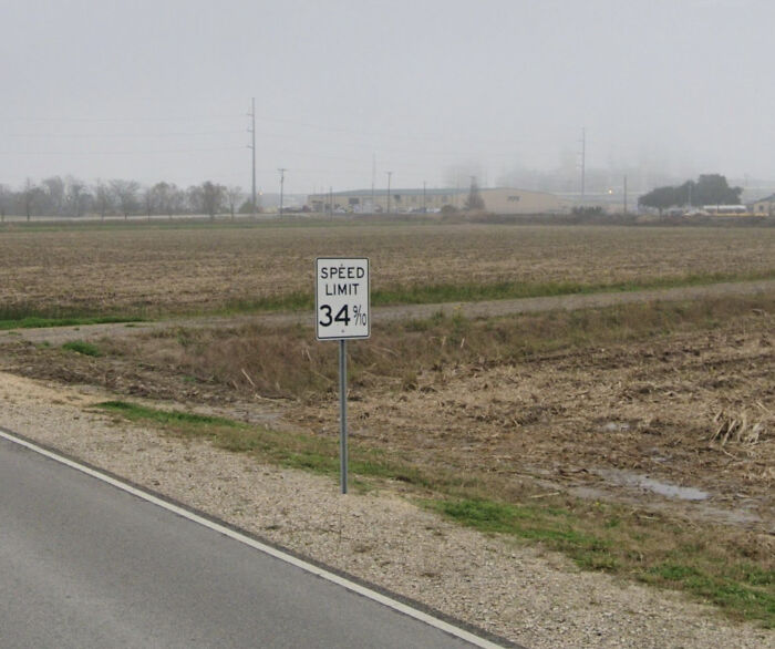 Unusual road with a speed limit sign showing 34 percent, one of the shenanigans captured on Google Maps.