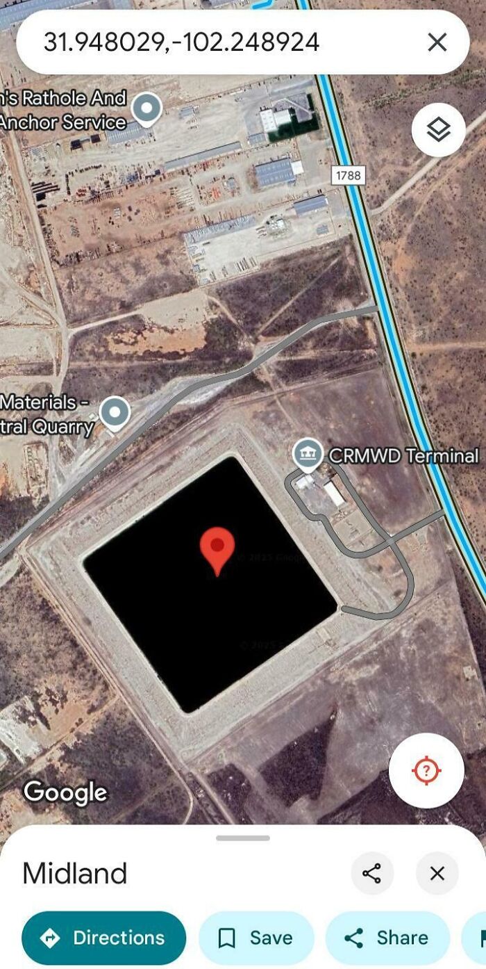 Google Maps screenshot showing a large black square body of water near Midland with surrounding industrial area.