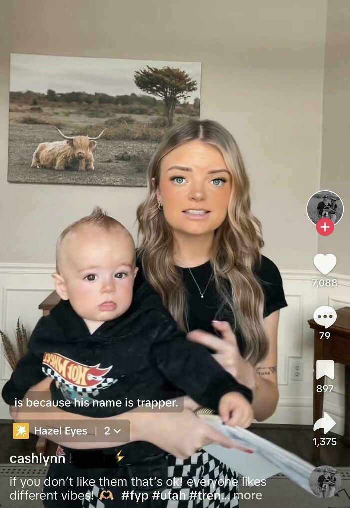 Woman holding baby in a home setting discussing Wednesdaigh Adams baby names that parents loved but others judged.