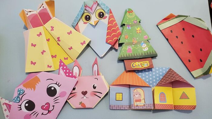 Colorful paper crafting kits featuring animals, holiday themes, and decorative designs for creative DIY projects.