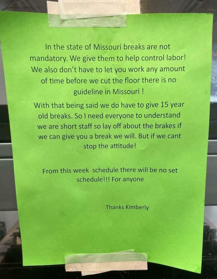 A toxic work environment sign detailing no mandatory breaks and no set schedule, reflecting poor employee treatment.