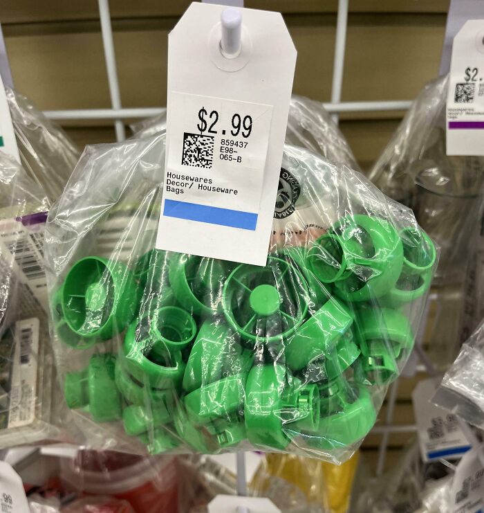 Bag of green plastic clips for $2.99 at a thrift store, an unusual thrift store find shared online.