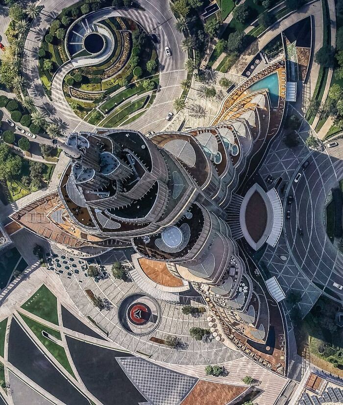 Aerial view of a famous landmark showcasing its unique architectural design from an unexpected angle and perspective.