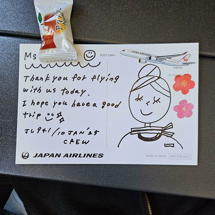 Japan Airlines postcard with a handwritten thank you note and a candy, inspiring those with fear of flying.