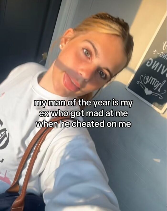 Woman posing for selfie with text overlay about man of the year and ex cheating, highlighting men of the year theme.