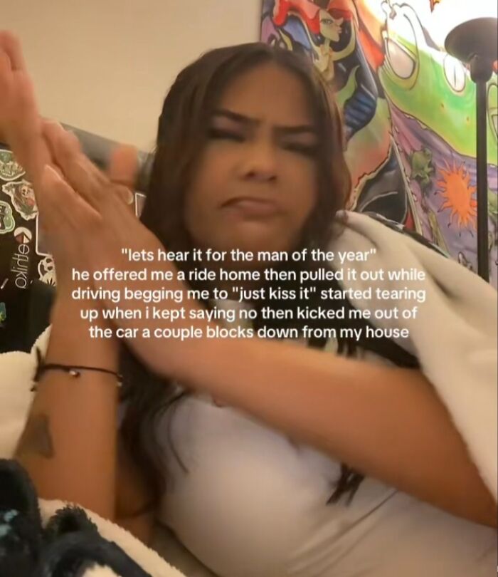 Woman sharing unhinged screenshots about men of the year with expressive gestures in a colorful room.