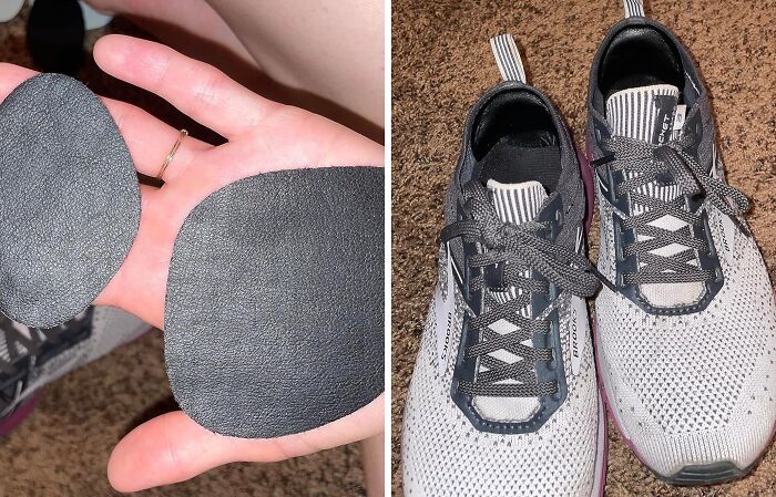 Close-up of hand holding black shoe inserts alongside a pair of white and gray athletic sneakers trending in the Pandaverse.
