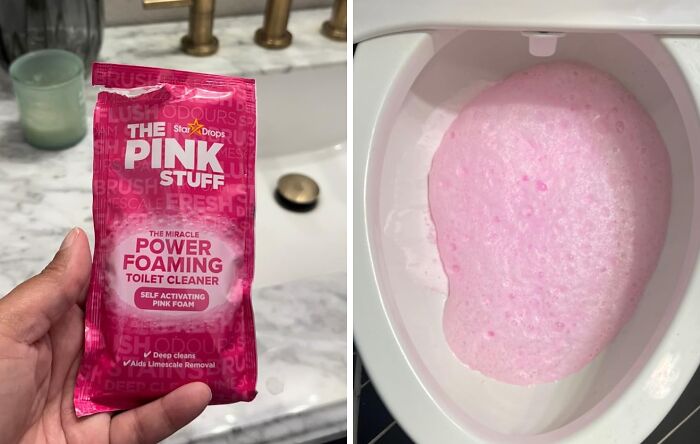 Hand holding The Pink Stuff foaming toilet cleaner packet next to toilet bowl filled with pink foam, star performer product.