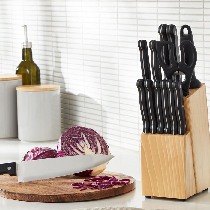 Knife block set on kitchen counter with knives cutting purple cabbage, ideal kitchen Prime Day wishlist finds.