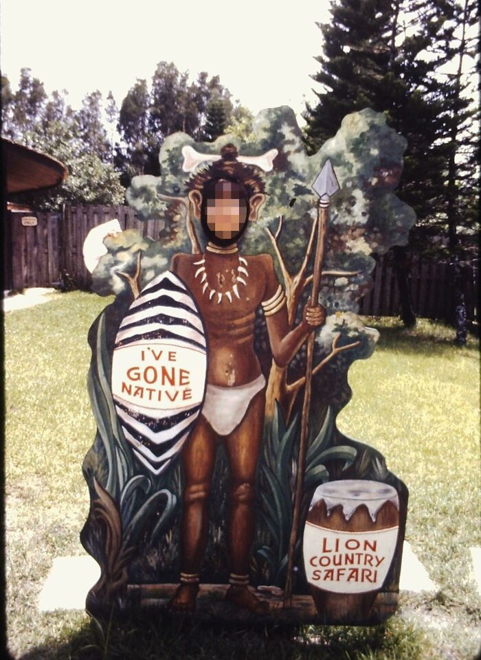 Person posing with face in cutout of a vintage Lion Country Safari cardboard figure, one of the ridiculous pics from the past.
