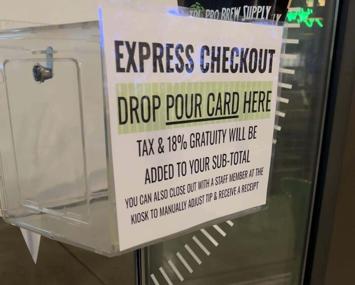 Sign at express checkout box showing automatic 18% gratuity added, illustrating how ridiculous tipping culture has gotten.