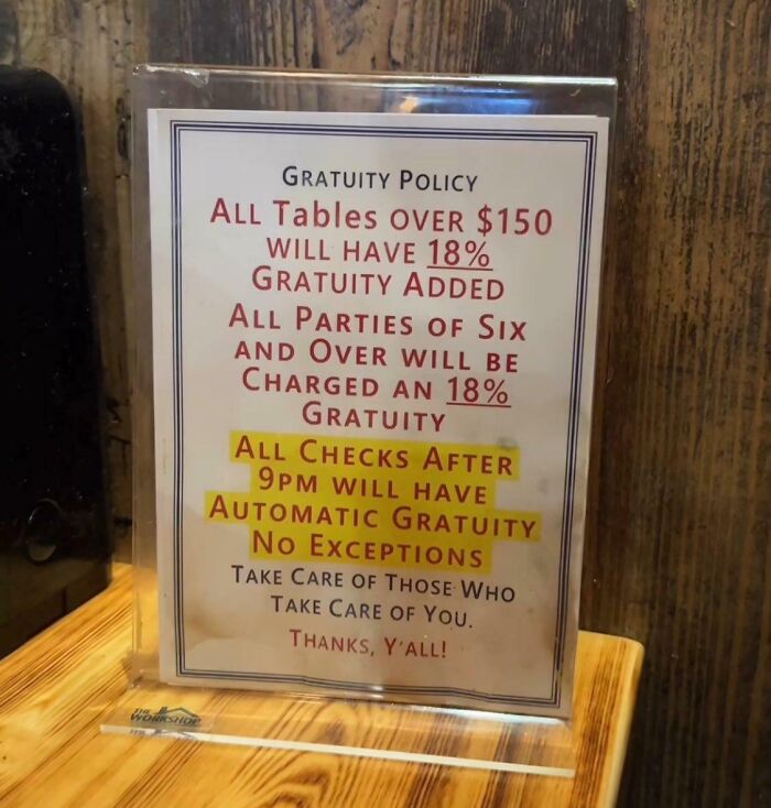 Sign displaying tipping culture with automatic 18% gratuity for large groups and late-night checks.