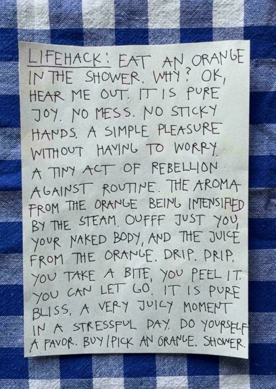 Handwritten note on a blue checkered tablecloth showing a neat example of perfect handwriting.