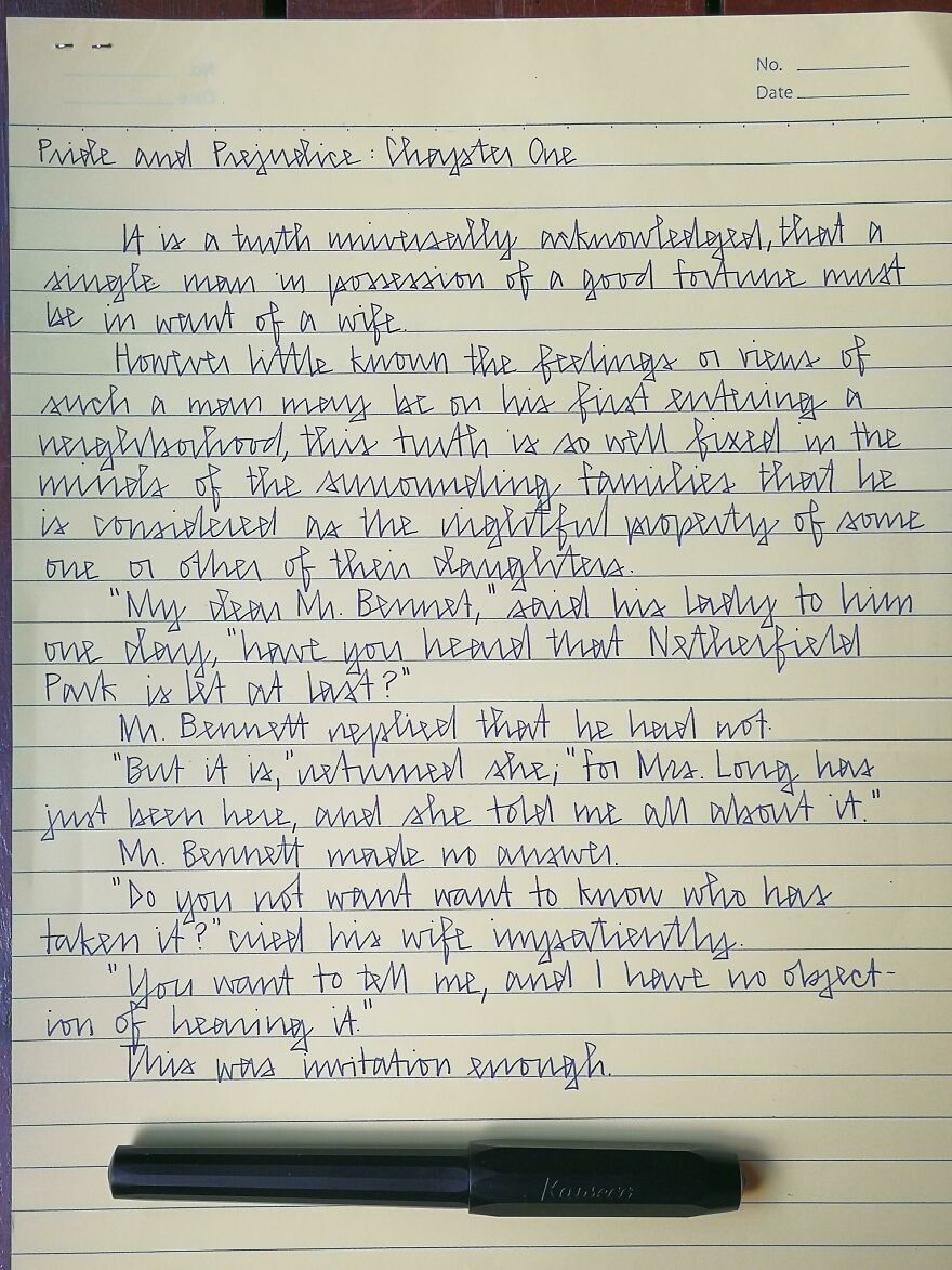 Handwriting example of Pride and Prejudice chapter one neatly written on lined paper with a black pen beneath.