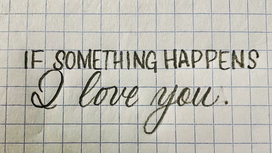 Handwriting example on grid paper showing the phrase I love you in perfect penmanship style.