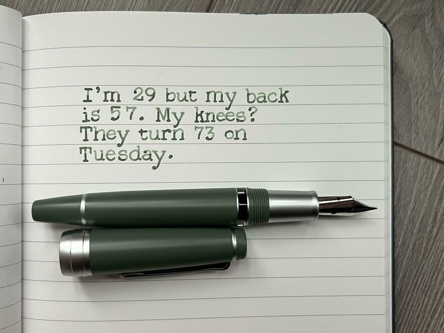 Neatly handwritten text about age and aches in a lined notebook with a green fountain pen resting on the page.