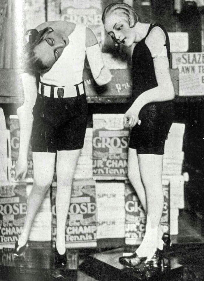 Vintage creepy doll-like mannequins in unsettling poses, evoking eerie vibes from old unsettling photos.