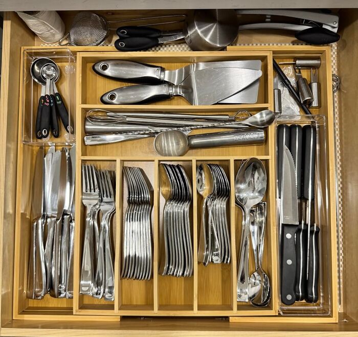 Organized kitchen drawer with cutlery, utensils, and several tools showcasing Prime Day home deals for kitchen essentials.