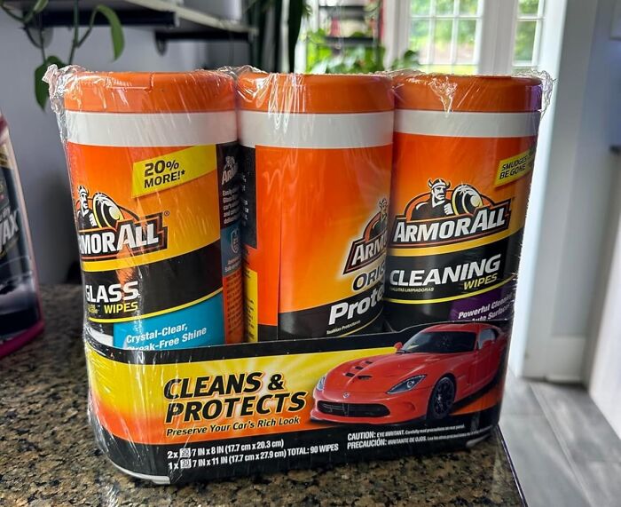 Armor All cleaning wipes pack for cars on a kitchen counter, offering deals to keep your bank account safe.
