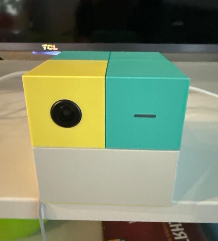 Small colorful cube-shaped tech gadget with a camera lens, featured in most wanted Prime Day deals for shoppers.