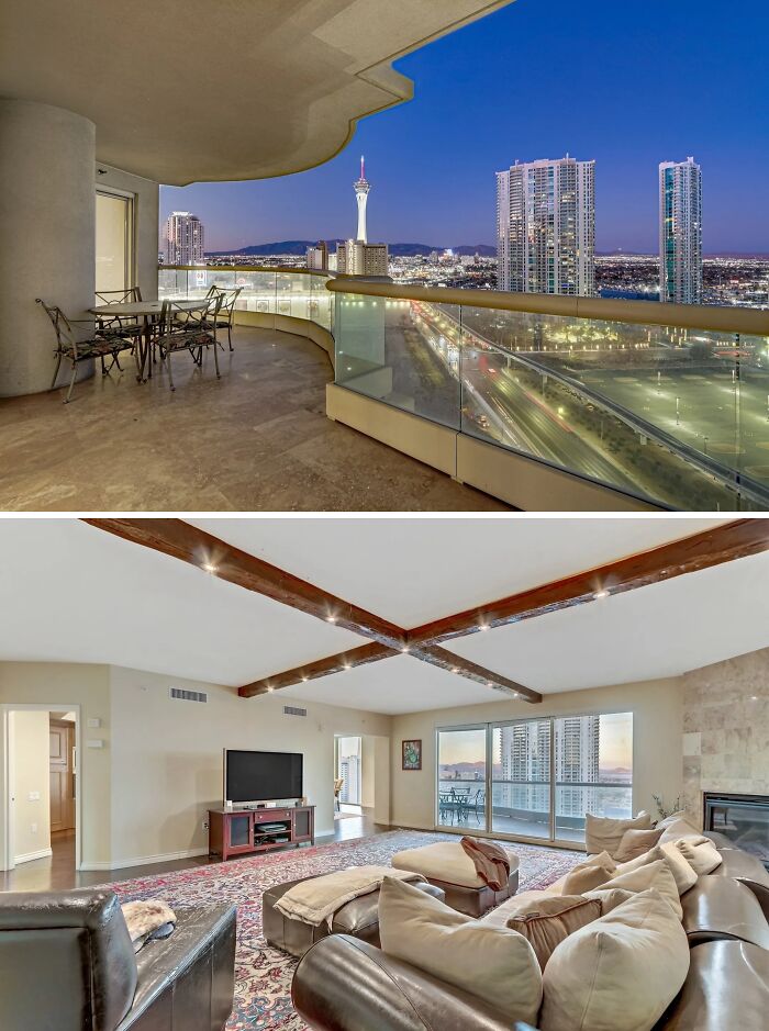 Spacious apartment balcony with city view and large living room featuring exposed beams and modern furnishings.