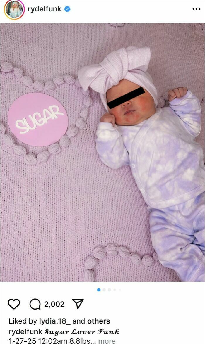 Baby lying on a purple blanket with a headwrap, next to a heart and sign representing baby names loved and judged.