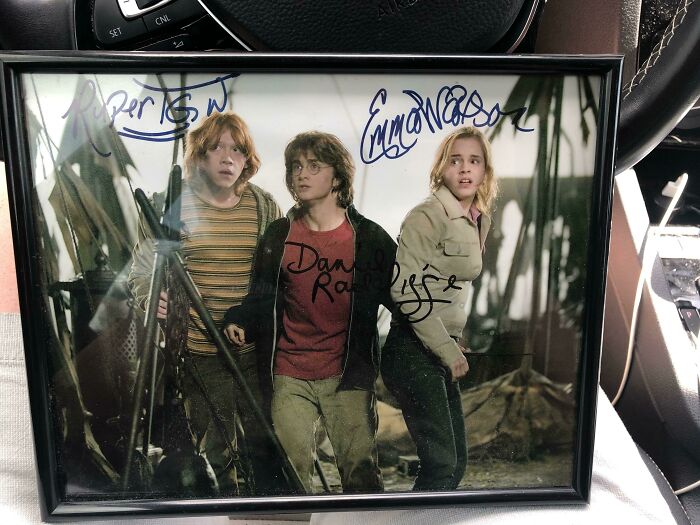 Framed signed photo of three actors as young characters, showcasing people experiencing unbelievable luck in collectibles.