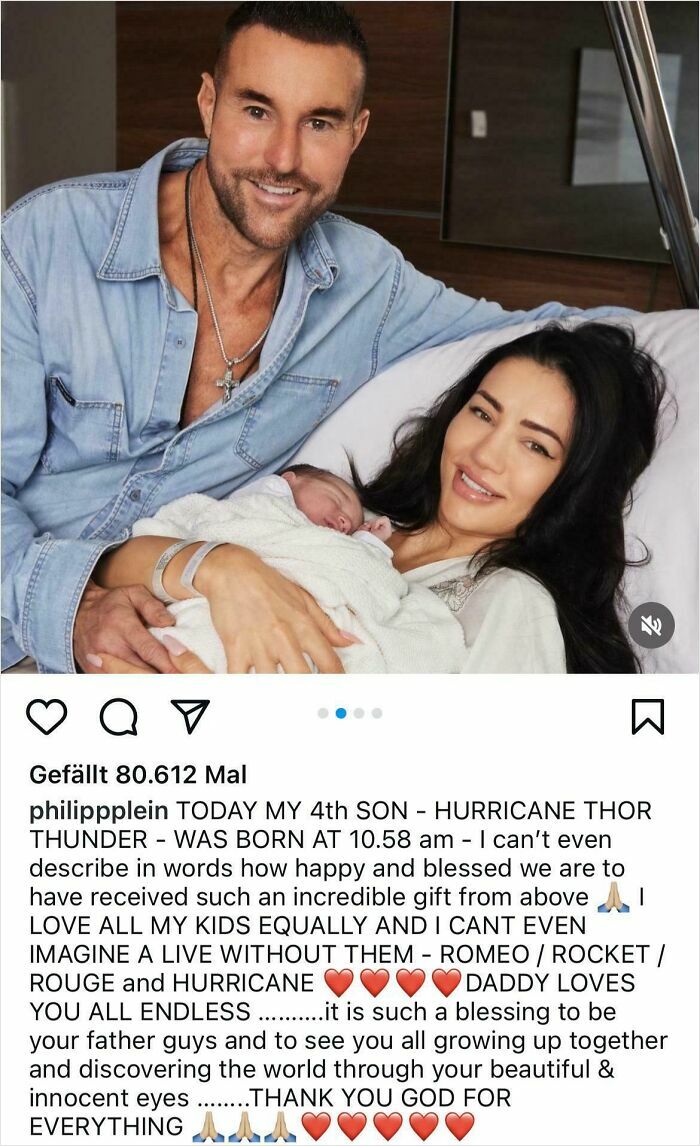 Couple smiling and holding newborn baby in a hospital bed, symbolizing unique baby names parents loved despite judgment.