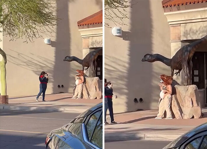 Unhinged influencer wearing a dinosaur headpiece posing for photos outside a building for crazy views and shaming.